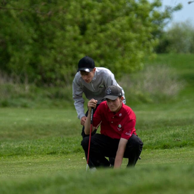 Karsten Kropat mit Caddie Felix Hohmann